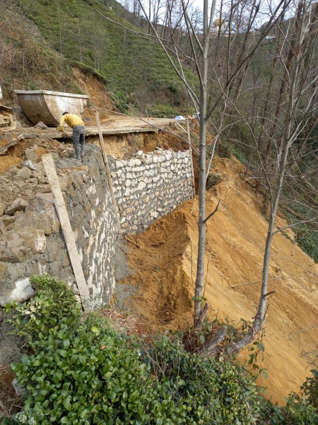 TAŞ DUVAR VE YOL BETONU ÇALIŞMALARIMIZ